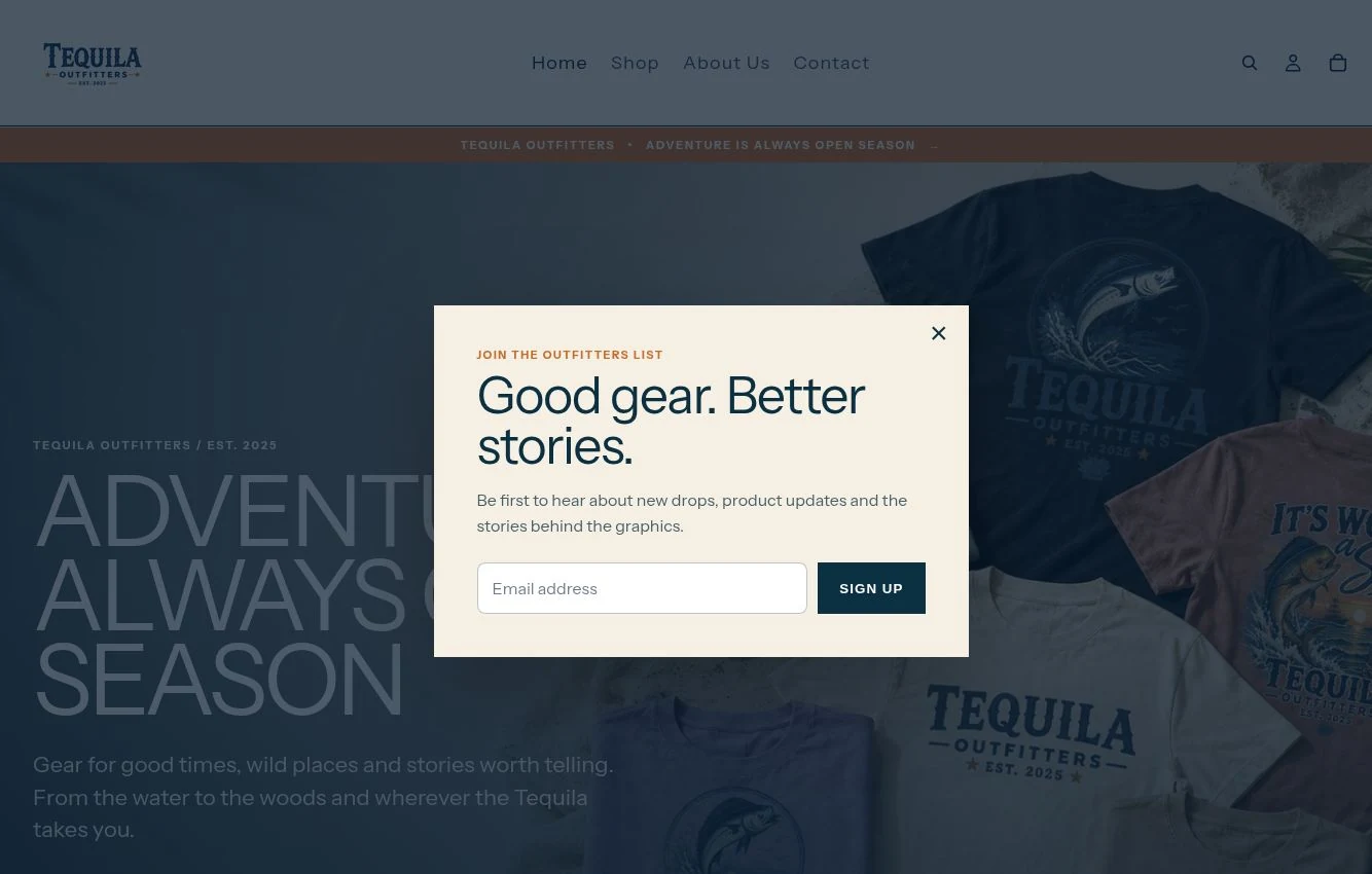 Tequila Outfitters Shopify homepage hero with graphic T-shirts, the Adventure Is Always Open Season headline and shopping links